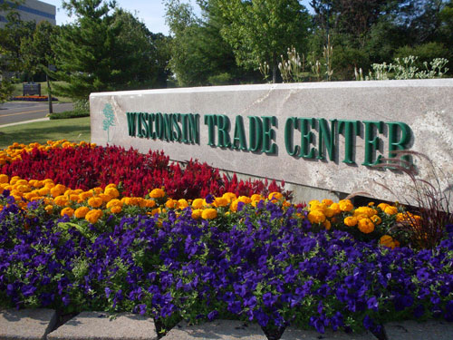 Flowers In Front Of Wisconsin Trade Center Sign